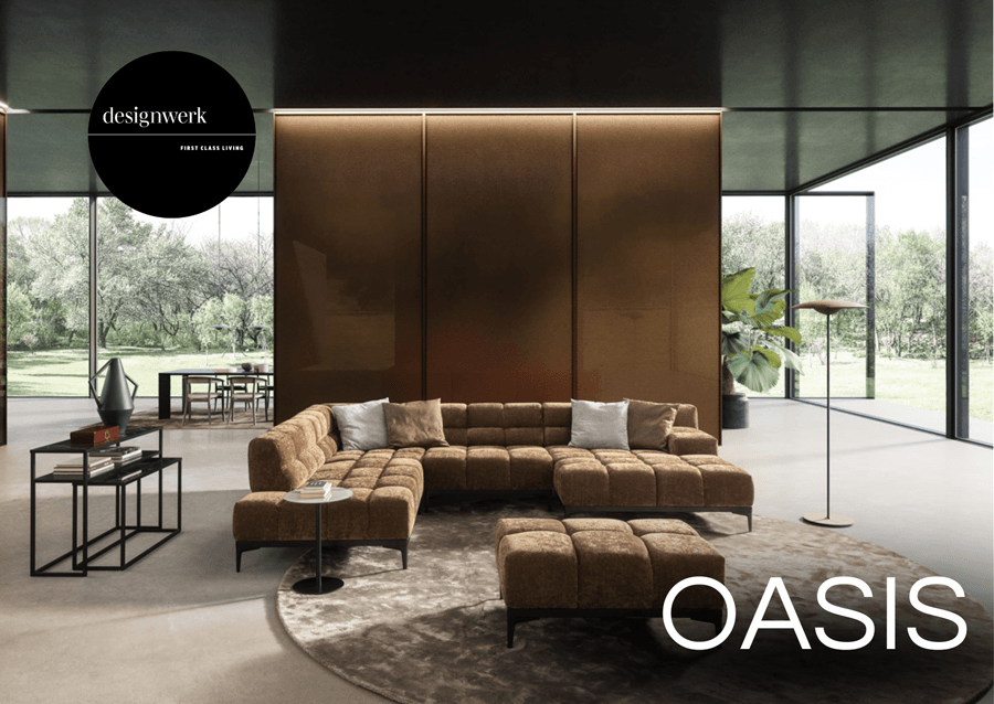 Couch mit Karo-Steppung - klassisches Chesterfield Muster. Aufschrift "Oasis"